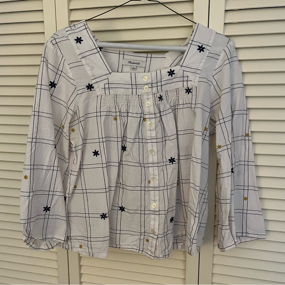 Madewell white top with flowers.
